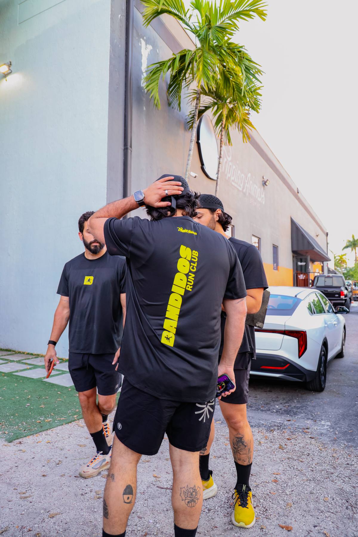 Back of a Bandidos Run Club jersey in electric yellow